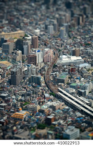 Tokyo urban rooftop view background tilt-shift effect, Japan.