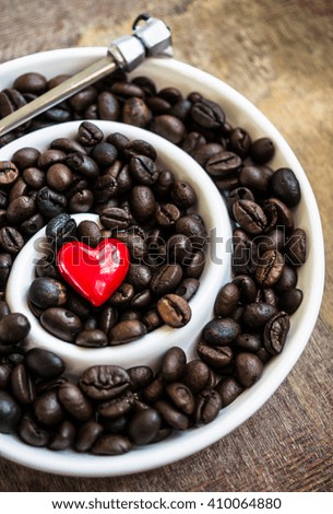 Coffee beans on rustic background