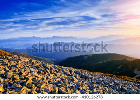 Rocky mountain, glowing in sunlight. Location place: Carpathian, Ukraine, Europe Artistic picture. Beautiful nature. Instagram toning effect.