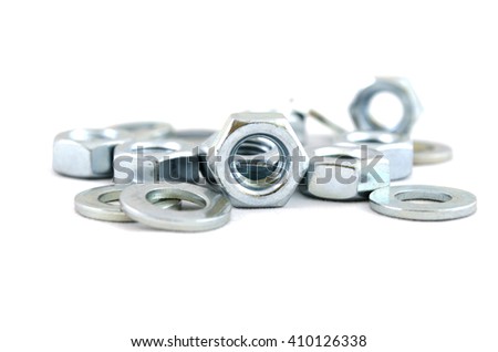 Several metal screw washers and nuts isolated on white background.