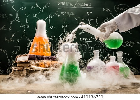 Checking the chemical formula in academic laboratory Royalty-Free Stock Photo #410136730