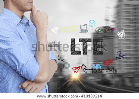 young man stand and thinking with LTE text ,business concept 