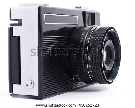 vintage film photo camera on a white background