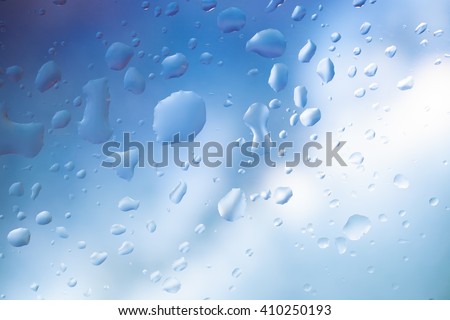 Drops of water on a color background. Shallow depth of field. Selective focus.