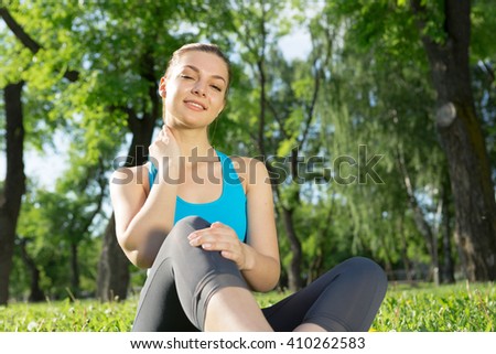 Woman meditating in park