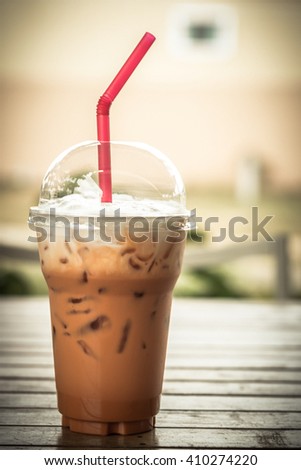 iced milk tea : Focus only part of the picture, dark tone