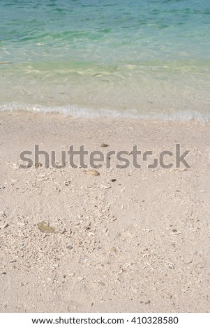 Thailand islands sea shore beach rocks white coral sand blue sky

