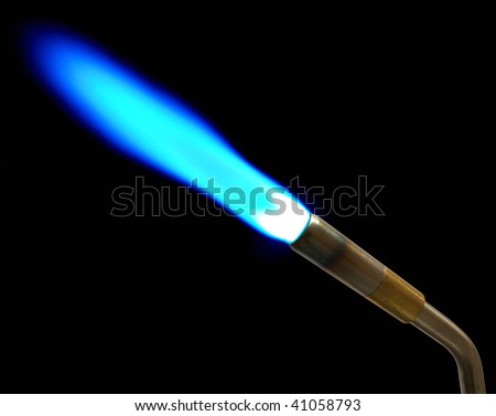 This a MAPP gas torch shot in the dark to capture blue flame Royalty-Free Stock Photo #41058793