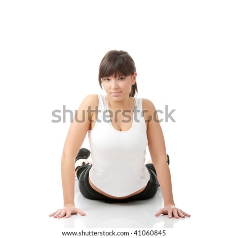 Physical training (aerobics) of beautiful young woman isolated on white background