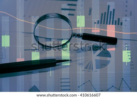 Data analyzing in forex market with magnifying glass, pen and calculator : the charts and summary info on paper. Charts of financial instruments for technical analysis.