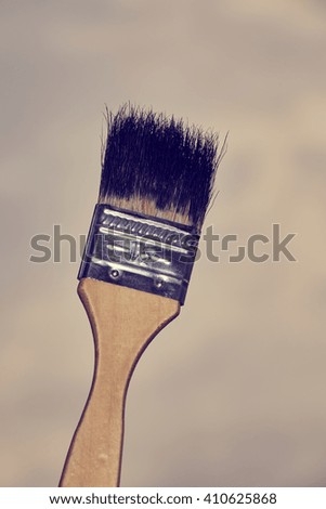   paint brush, sky as background                             
