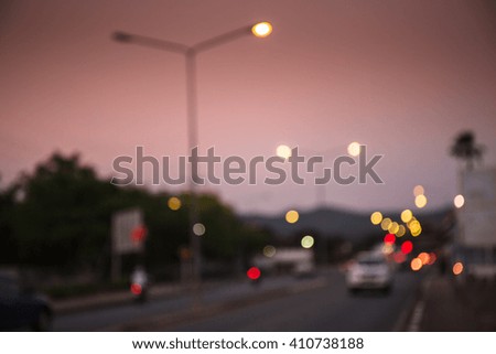 Out of focus traffic and lights in twilight time