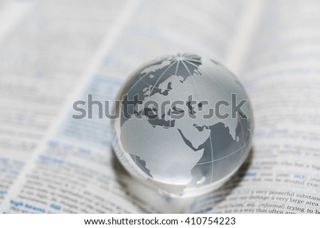 dictionary and globe