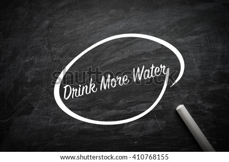 Drink more Water word on blackboard