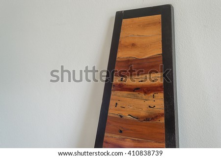 Empty wood texture over cement wall background