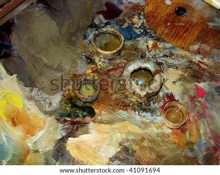   palette of  artist with oil paints
