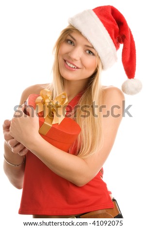 Portrait of pretty christmas teenage girl holding heart gift isolated on white background