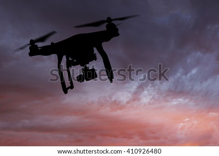 Drone with high resolution camera flying, close-up.