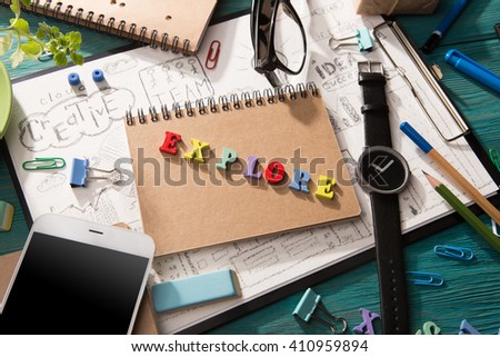 explore concept - inscription and office supplies on the desk 