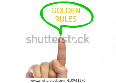 hand writing golden rules talking balloon on a transparent wipe board.