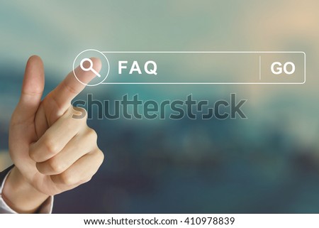 business hand clicking FAQ or Frequently asked questions button on search toolbar with vintage style effect Royalty-Free Stock Photo #410978839