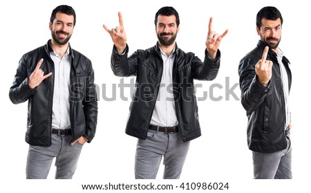 Man with leather jacket making horn gesture