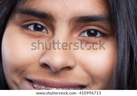 happy latin girl  eyes closeup