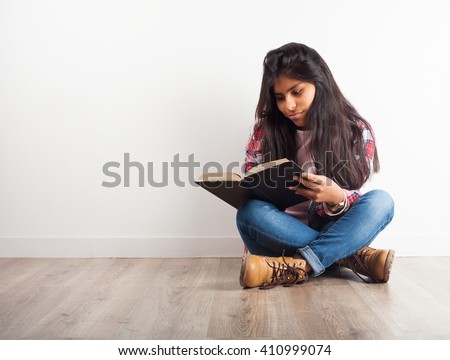 latin girl reading a book