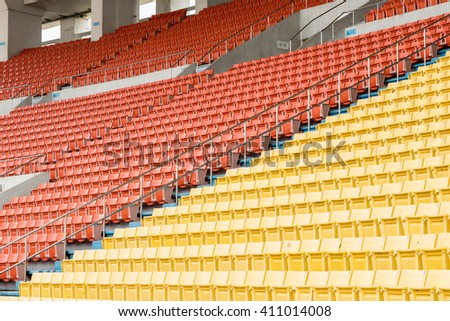 Red and yellow stadium seats