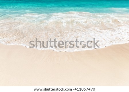 Wave of the sea on the sand beach in Punta Cana, Dominican Republic