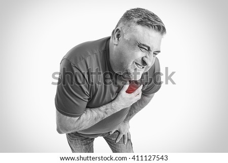 Middle-aged man suffering from heart attack. Middle aged man suffering chest pain on white background.Negative human emotion, facial expressions, feelings. Black & White picture.