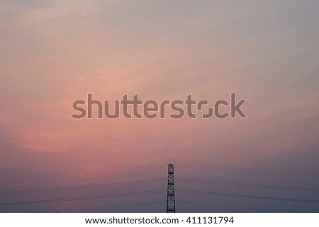 electric wire post with sunset background 