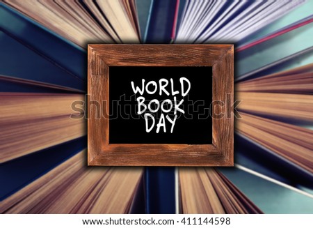 World Book Day concept. Text in frame on blurred books background