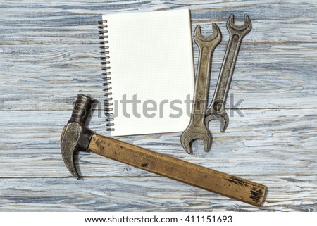 Flat lay: set of tools on a wooden background, copyspace