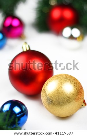 Christmas border of evergreen, ornaments,