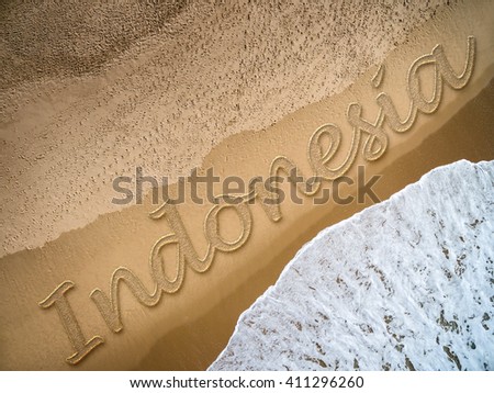 Indonesia written on the beach