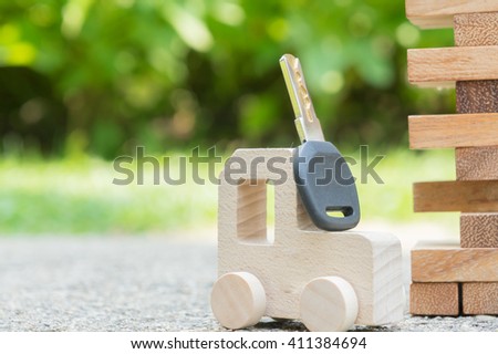 wooden car pick up key, key to success concept