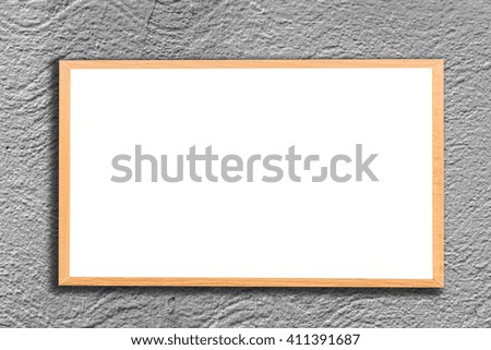 Mock up blank wooden picture frame on brick wall
