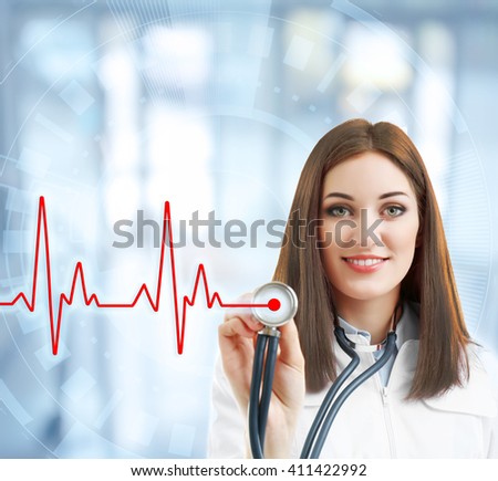 Young beautiful doctor with stethoscope on virtual screen. Medical concept