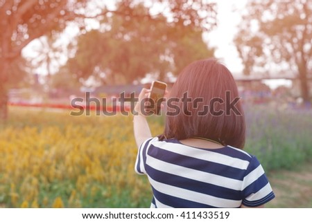 Beautiful girl making selfie photo on smartphone