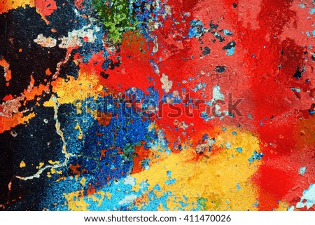 The surface of the wall, painted a bright bright color brilliant red yellow orange paint