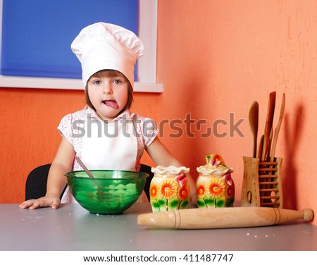 little cute chef cooking biscuits