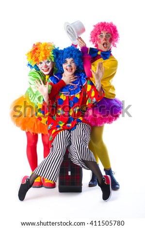 funny colorful clown animators children's holiday fooling around on a white background