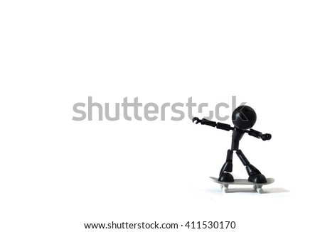 Black robot playing white skateboard isolated