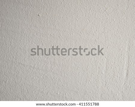 white wall plaster . gray paint stone wall .