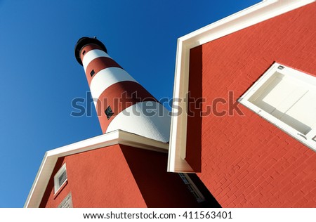 Assateague Lighthouse On a Sunny Day. Assateague Light is the 142-foot-tall lighthouse located on the southern end of Assateague Island off the coast of the Virginia Eastern Shore