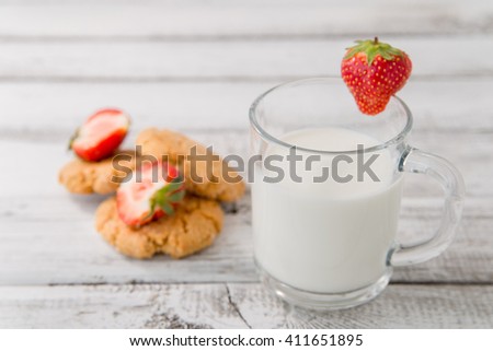 fresh healthy milk, strawberry and cookies