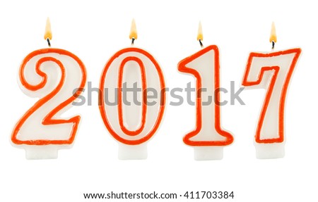 Burning candles on white background, number 2017, new year concept