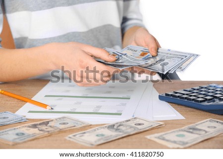 Man working on financial report at the office, close-up