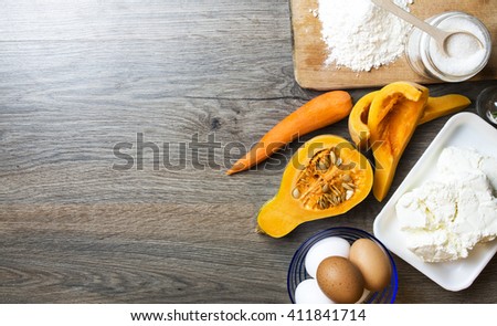carrot pumpkin pie with cheese (curd). ingredients for pumpkin pie - Home-Making (cooking). Vintage table with space for text. Recipe concept